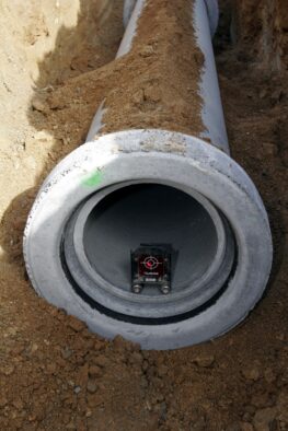 Pose de tuyaux béton
